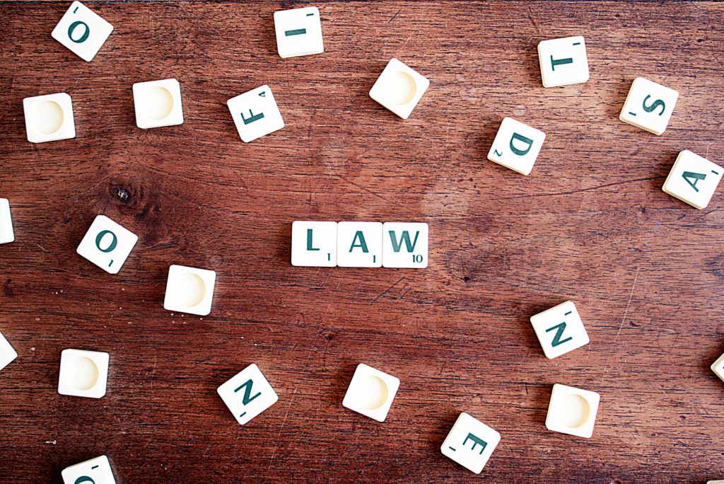 Law written out in Scrabble tiles